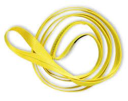 Yellow rope coiled on a white background